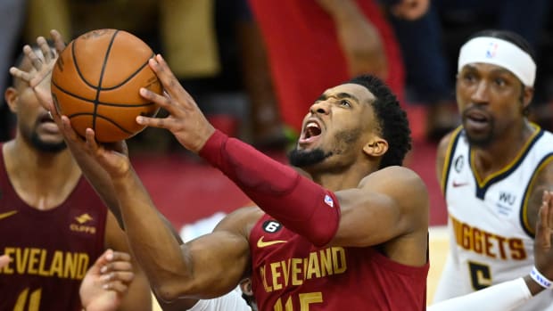 Cleveland Cavaliers guard Donovan Mitchell (45) drives to the basket in the fourth quarter against the Denver Nuggets at Rocket Mortgage FieldHouse.